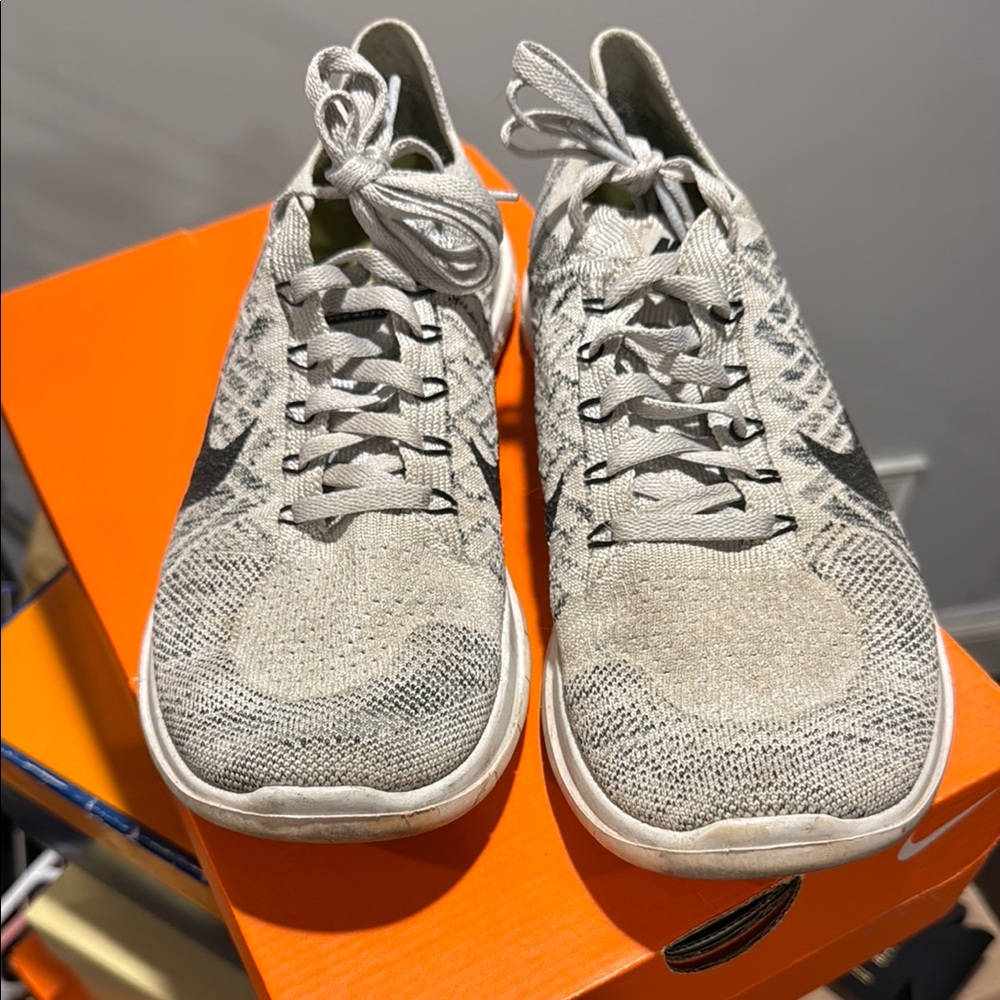 Nike Gray Sneakers with Knit Upper and Minimalist Design